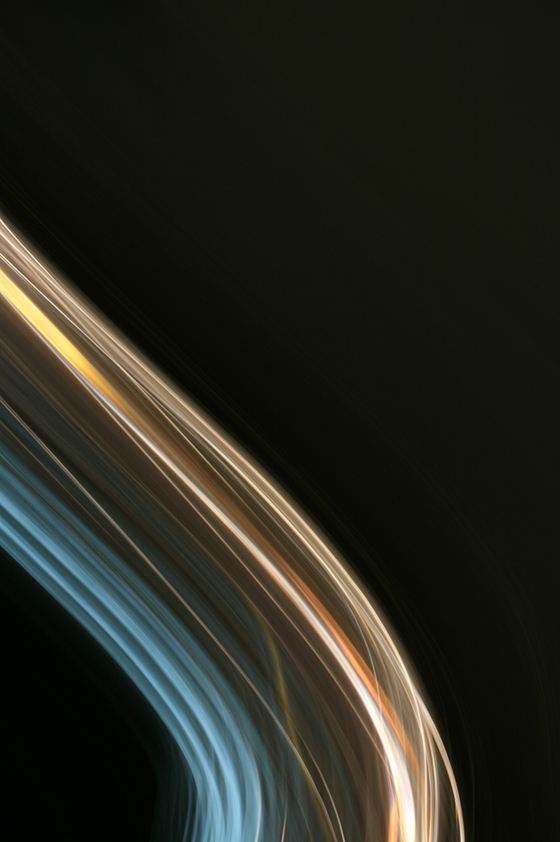 A curved line of light on black