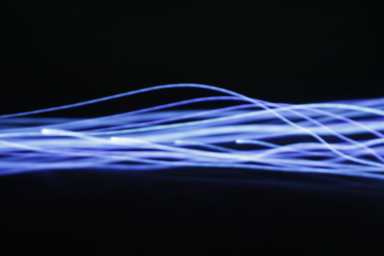 Blue light streaks on black